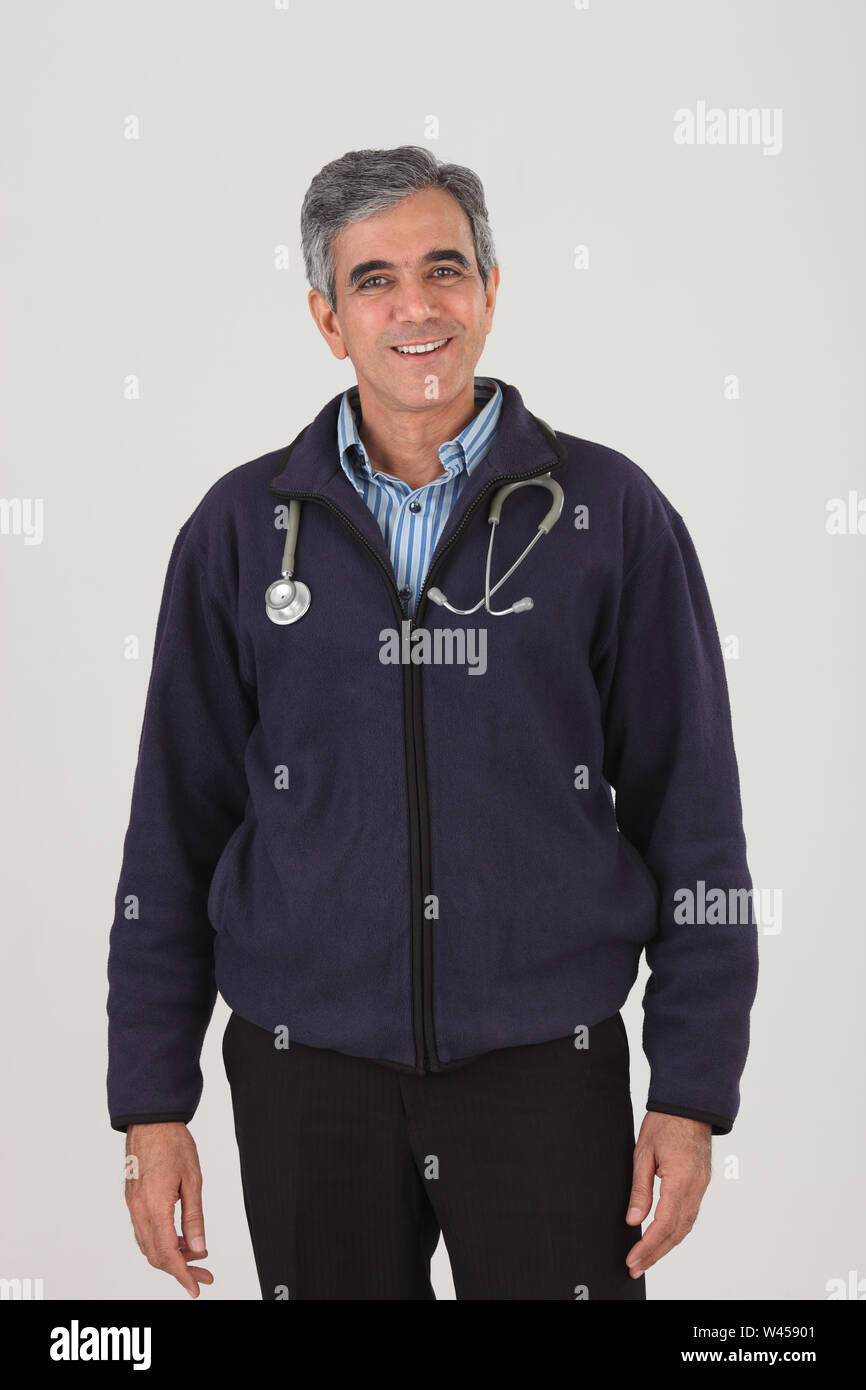 Portrait of a male doctor smiling Stock Photo - Alamy