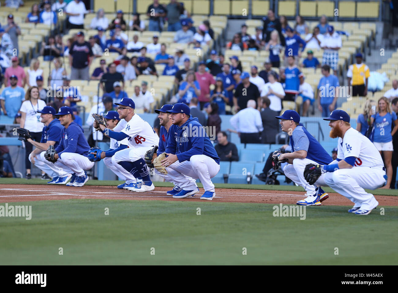 Los Angeles, CA, USA. 19th July, 2019. Eight Dodger players prepare for eight first pitches during the game between the Miami Marlins and the Los Angeles Dodgers at Dodger Stadium in Los Angeles, CA. (Photo by Peter Joneleit) Credit: csm/Alamy Live News Stock Photo