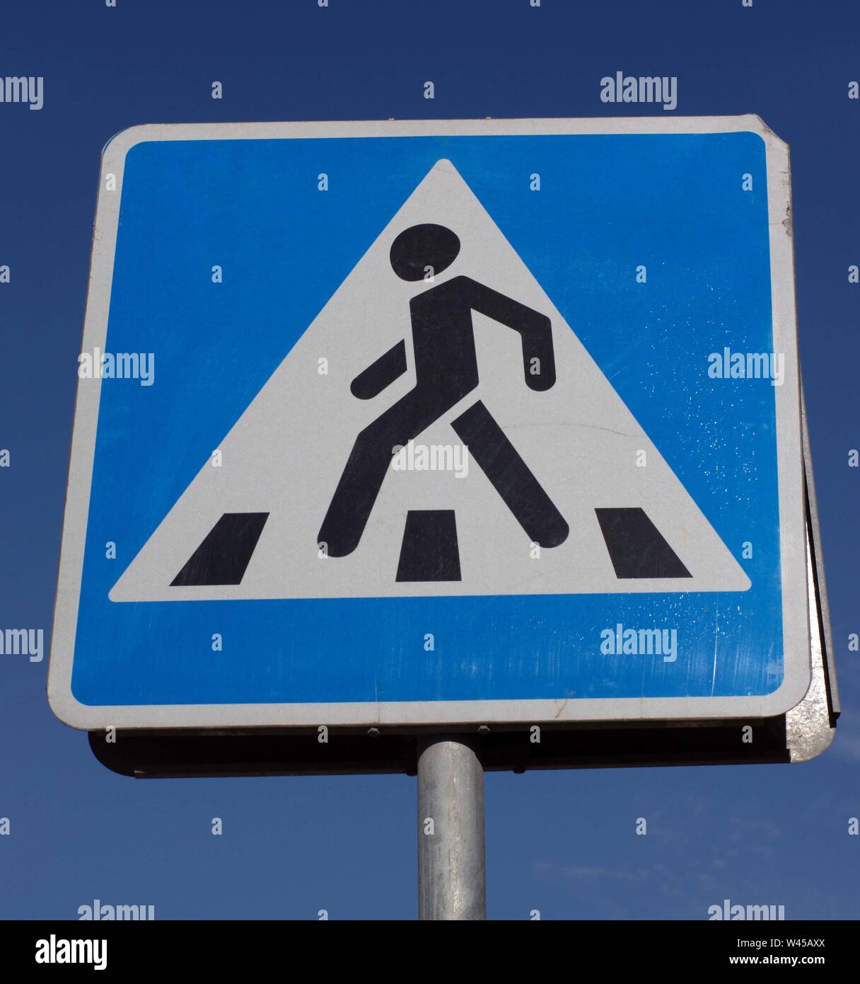 pedestrian crossing sign on street Stock Photo