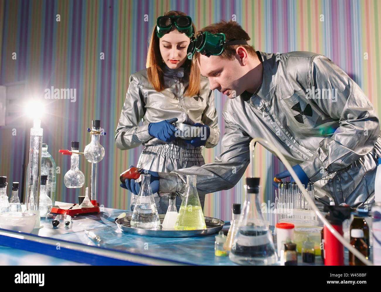 Experiments in a chemistry lab. conducting an experiment in the