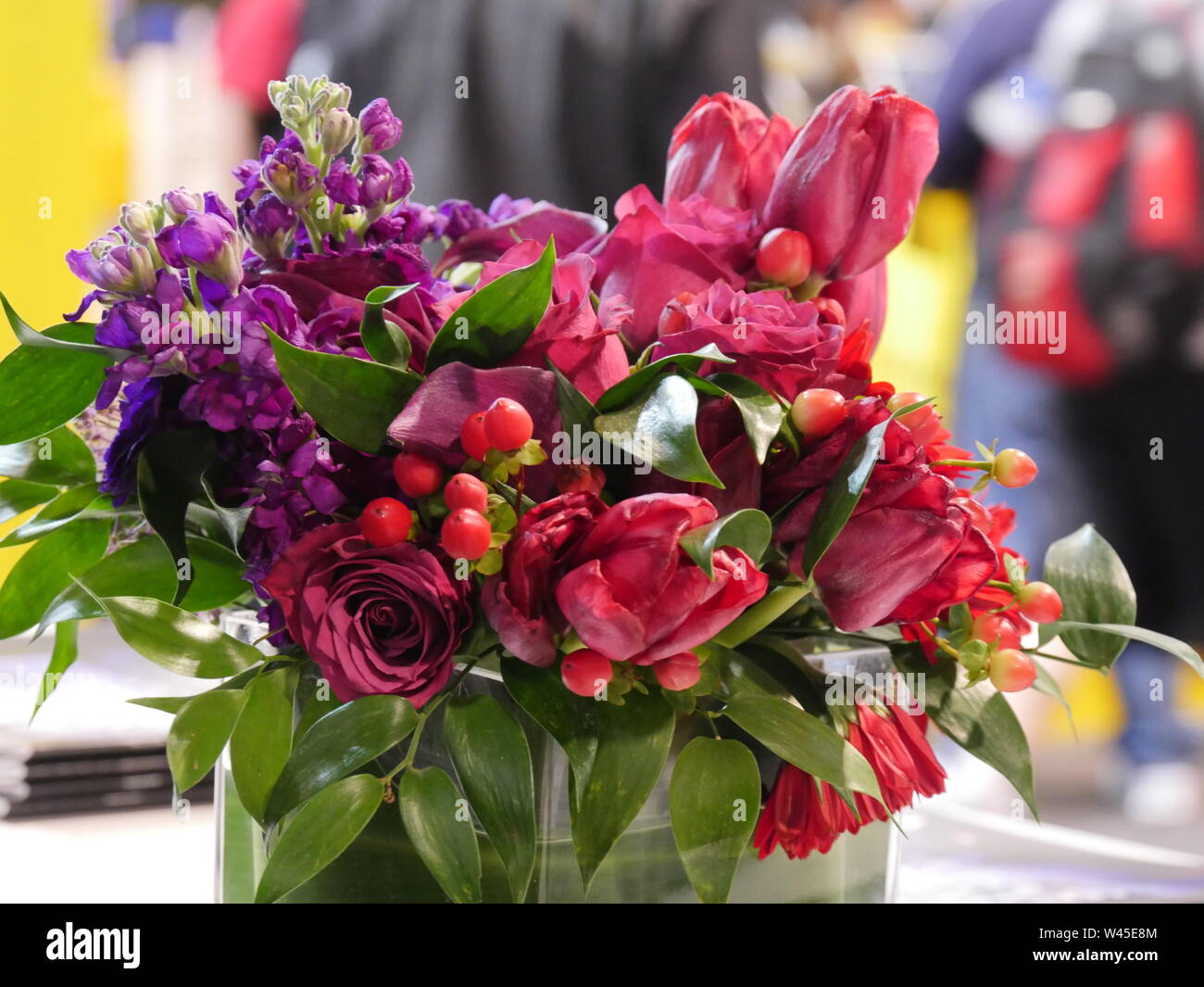 Big vase filled with an assortment of colorful flowers Stock Photo - Alamy