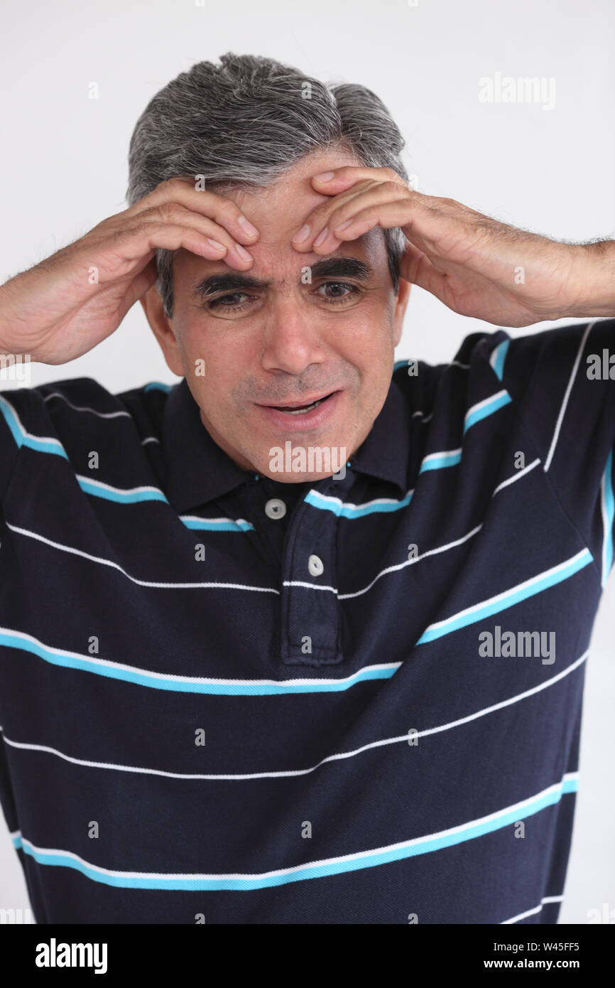 Man suffering from headache Stock Photo