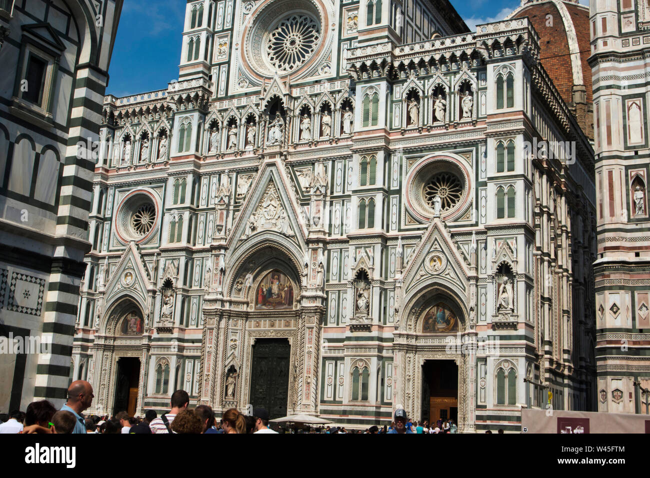 FLORENCE, ITALY, July 2018, Tourist at the entrance of the Florence Cathedral, Basilica di Santa Maria del Fiore. Stock Photo