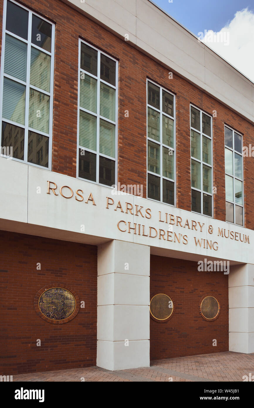 Round bronze Medallions depict civil right moments in art attached to the outer brick wall the Rosa Parks Library & Museum, Children's Wing in Montgom Stock Photo