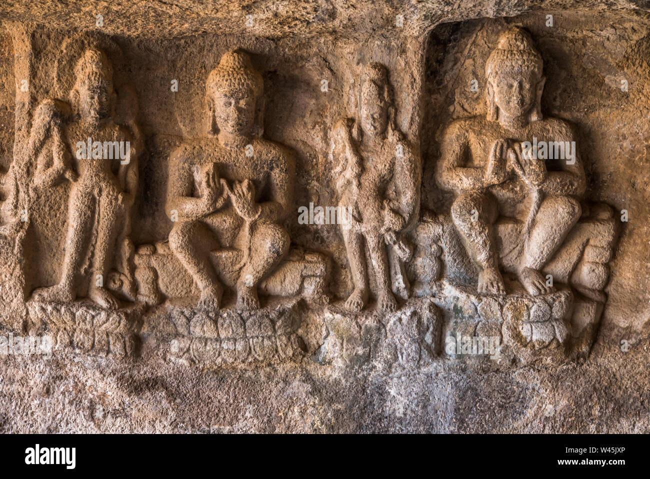 Cave 23 and 24, Buddhas in pralambapadasana with dharmachakra pravartana mudra or teaching attitude, Pandavleni Caves, Nasik, Maharashtra. Stock Photo