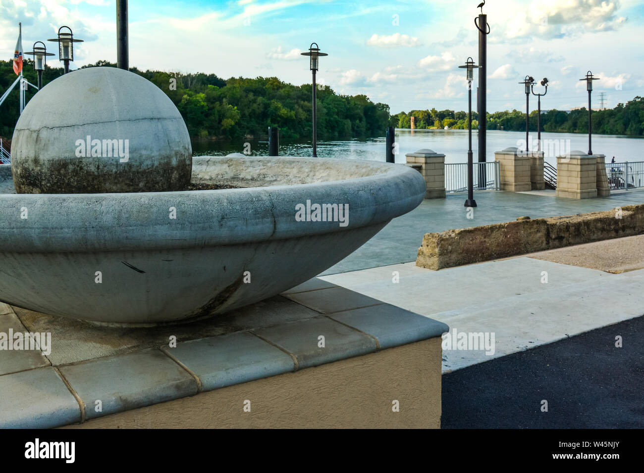 The Alabama River bends in the distance at Riverwalk Park with concrete