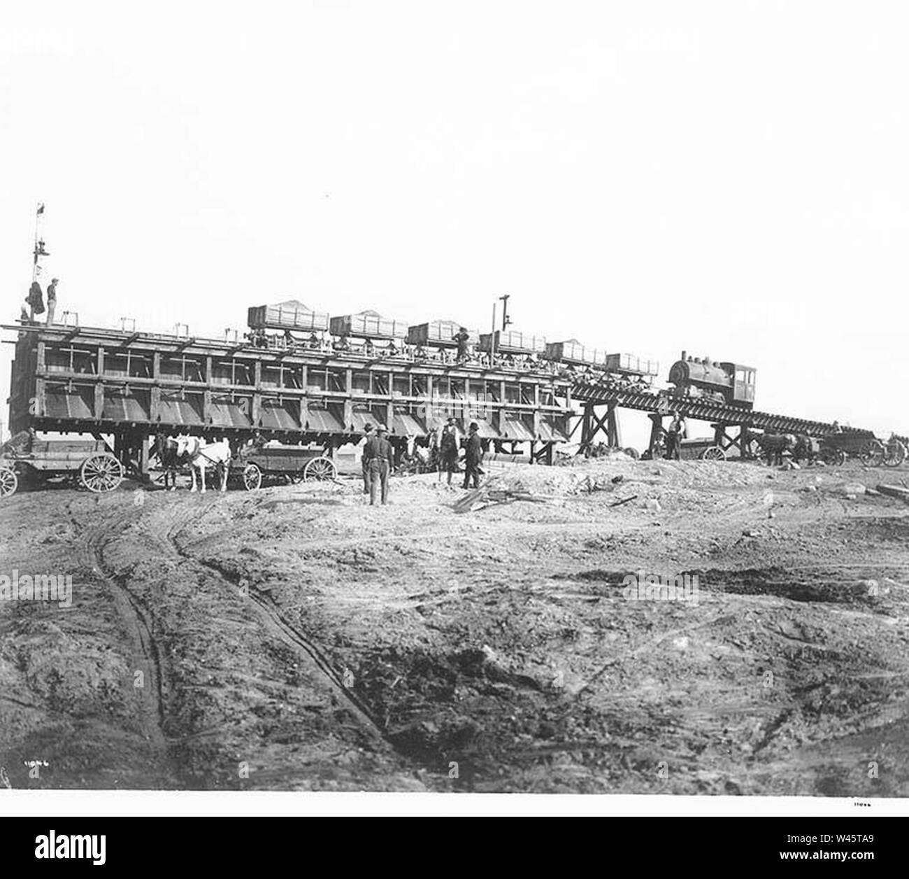 Construction train at work on excavation for water reservoir, Beacon Hill, Seattle (CURTIS 780). Stock Photo