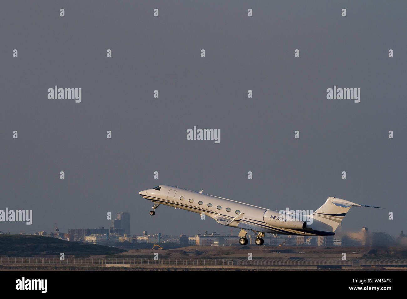 A Raytheon Hawker 800XP executive jet, operated by Travel Management Company Ltd, takes off from