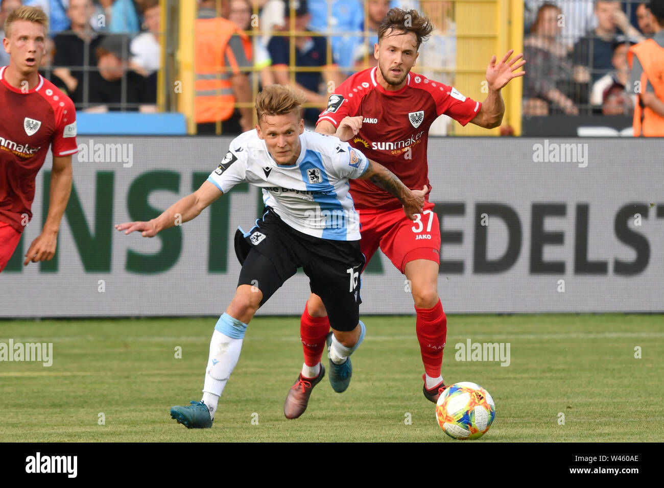 Munich, Deutschland. 19th July, 2019. Benjamin KINDSVATER (TSV Munich 1860), action, duels versus Lucas CUETO (MS). Soccer 3. Liga, 1. matchday, TSV Munich 1860-Prussia Muenster 1-1, on 19.07.2019 Stadium at Gruenwalder Strasse in Munich, DFL REGULATIONS PROHIBIT ANY USE OF PHOTOGRAPHS AS IMAGE SEQUENCES AND/OR QUASI-VIDEO. | usage worldwide Credit: dpa/Alamy Live News Stock Photo