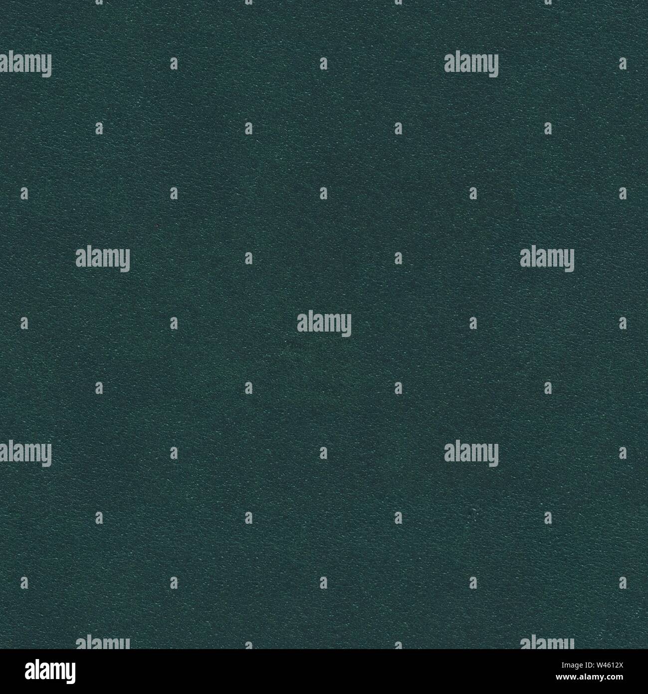 Green leather for background usage. Seamless square texture, tile ready.  Stock Photo