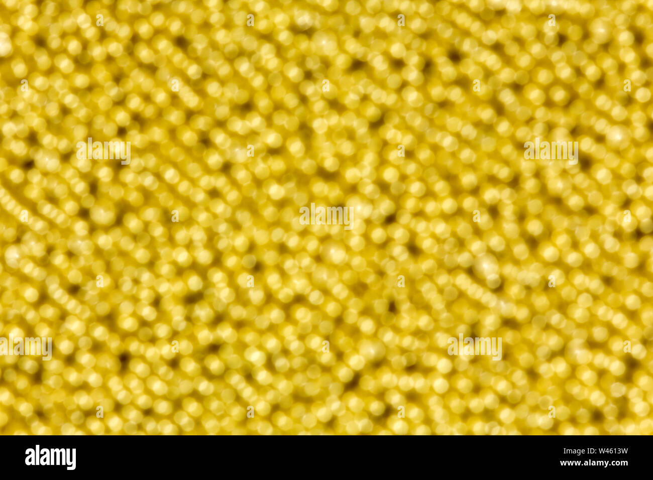 Bright yellow light bokeh background. Multi colored bright lights. Stock Photo