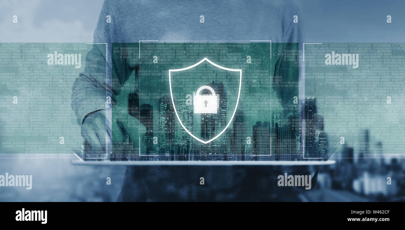 Online data security system and AI. artificial intelligence technology. a man using digital tablet with lock shielding lock icon Stock Photo