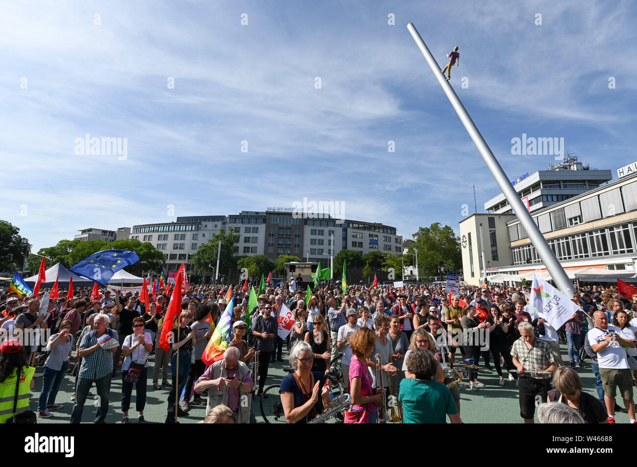 Kassel, Germany. 20th July, 2019. Thousands demonstrate against the march of the extreme right-wing small party 'Die Rechte'. The party had called for a demonstration in Kassel against media prejudgement in connection with the Lübcke case. A massive police presence is to prevent possible riots between the two camps. Credit: Uwe Zucchi/dpa/Alamy Live News Stock Photo