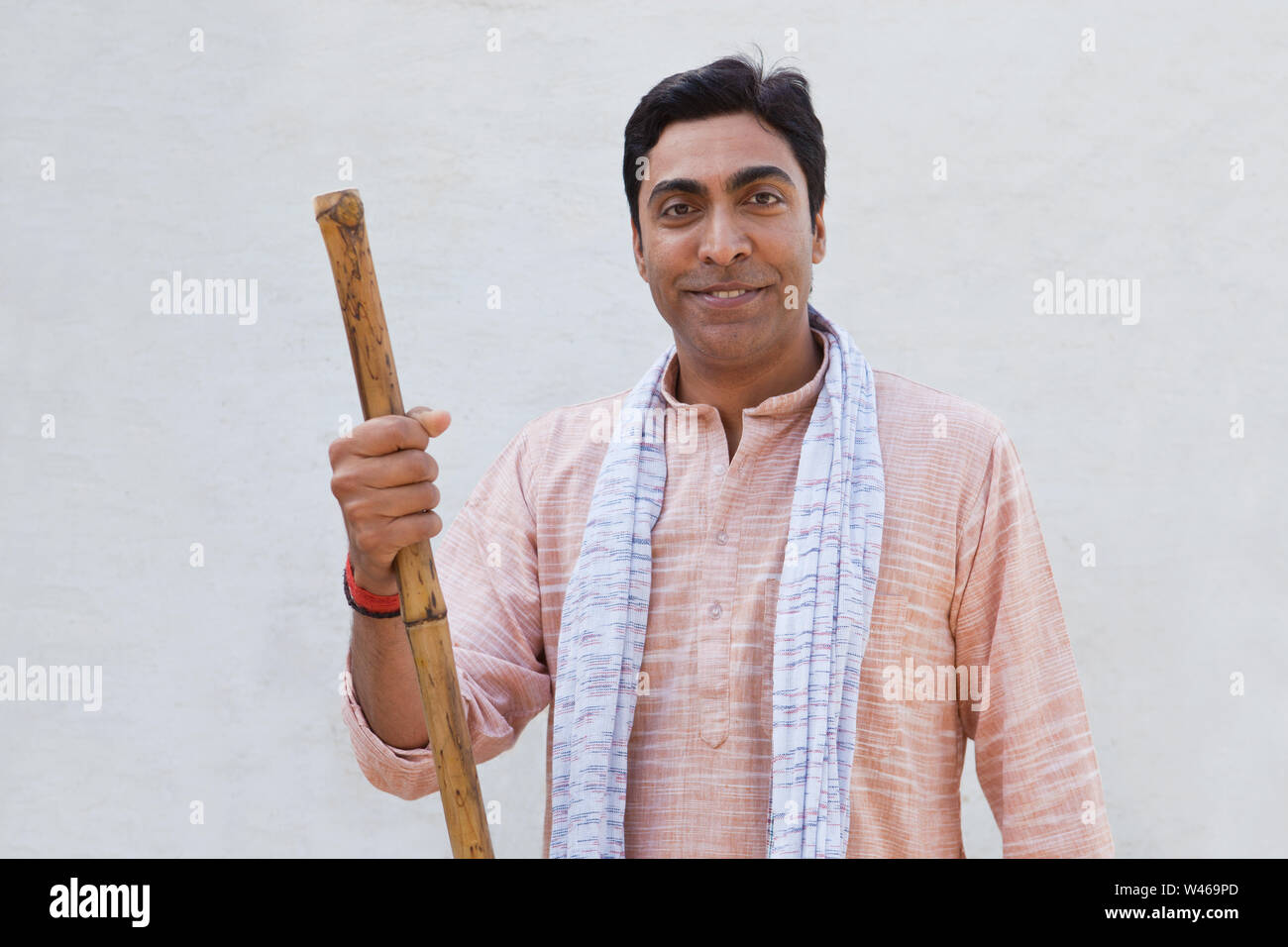 Portrait of a farmer smiling Stock Photo - Alamy