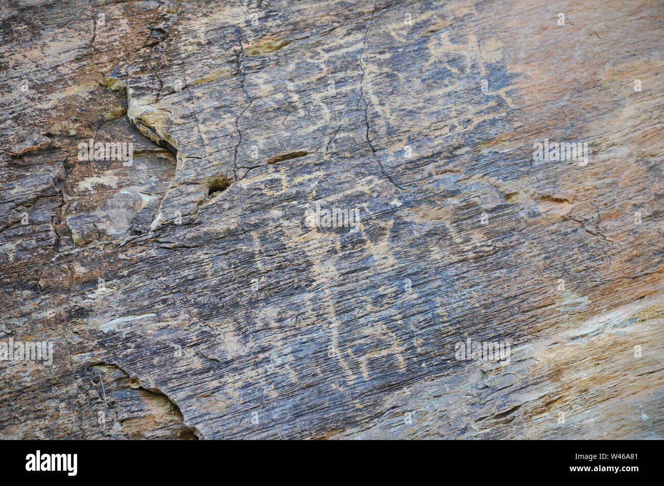 Ancient petroglyphs near Sentyob village in Nuratau mountains, Central Uzbekistan Stock Photo