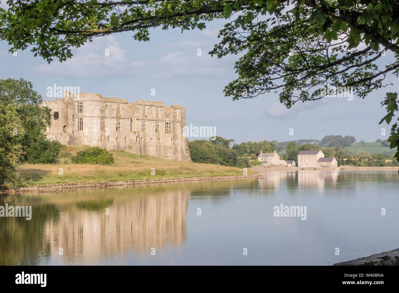 Carew Castle & Tidal Mill, Pembrokeshire, Wales, UK Stock Photo