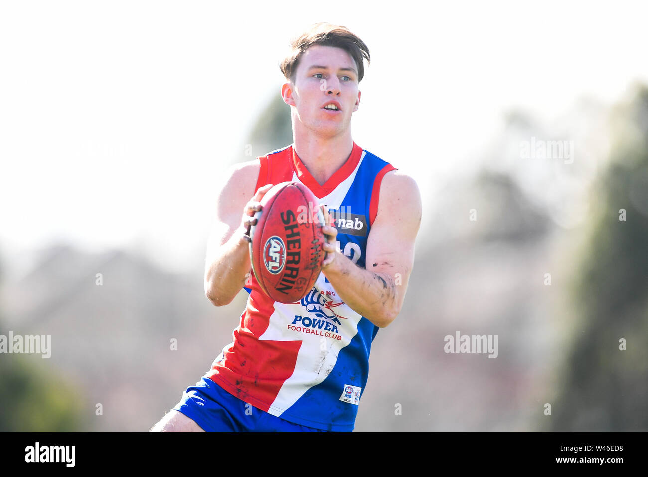 Box Hill City Oval, Melbourne, Australia. 20th July 2019. Australian Rules Football Under 18s Championships, Gippsland Power versus Tasmania Devils; Brock Smith of the Gippsland Power gathers possession of the ball Credit: Action Plus Sports Images/Alamy Live News Stock Photo