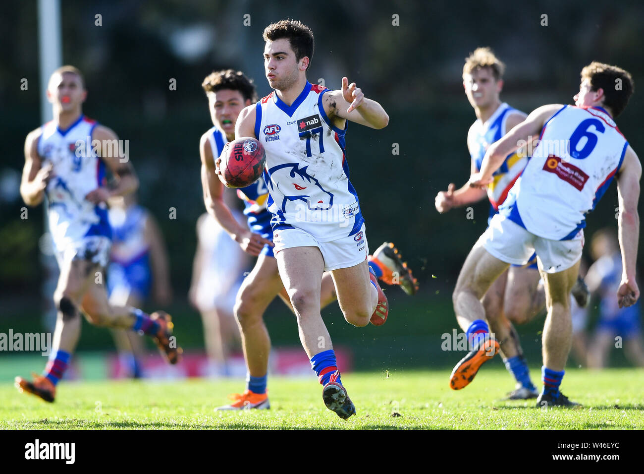Box Hill City Oval, Melbourne, Australia. 20th July 2019. Australian Rules Football Under 18s Championships, Eastern Rangers versus Oakleigh Chargers; Nicholas Stathopoulos of the Oakleigh Chargers kicks the ball Credit: Action Plus Sports Images/Alamy Live News Stock Photo