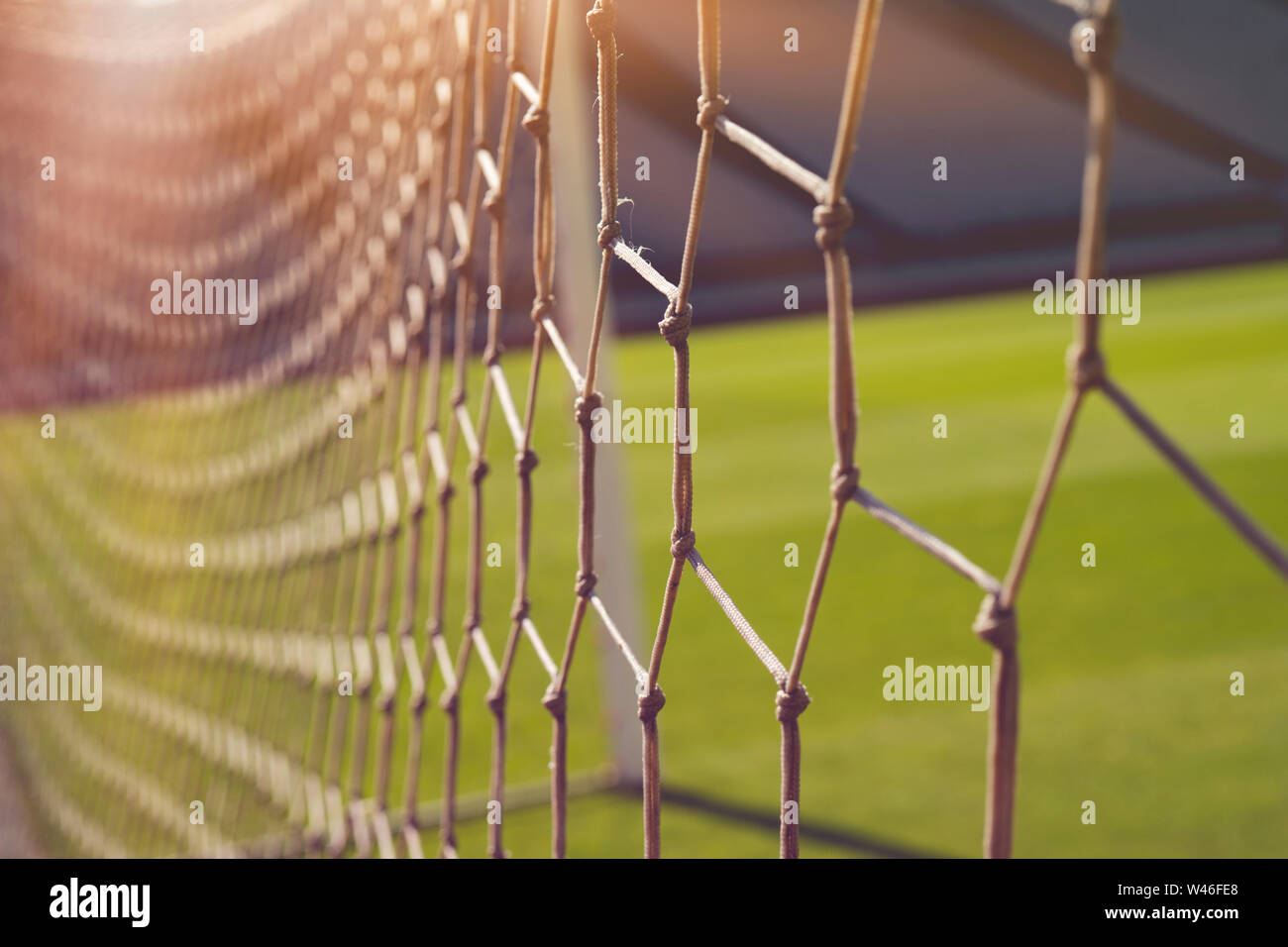 The net in Artificial turf at sunset. Stock Photo