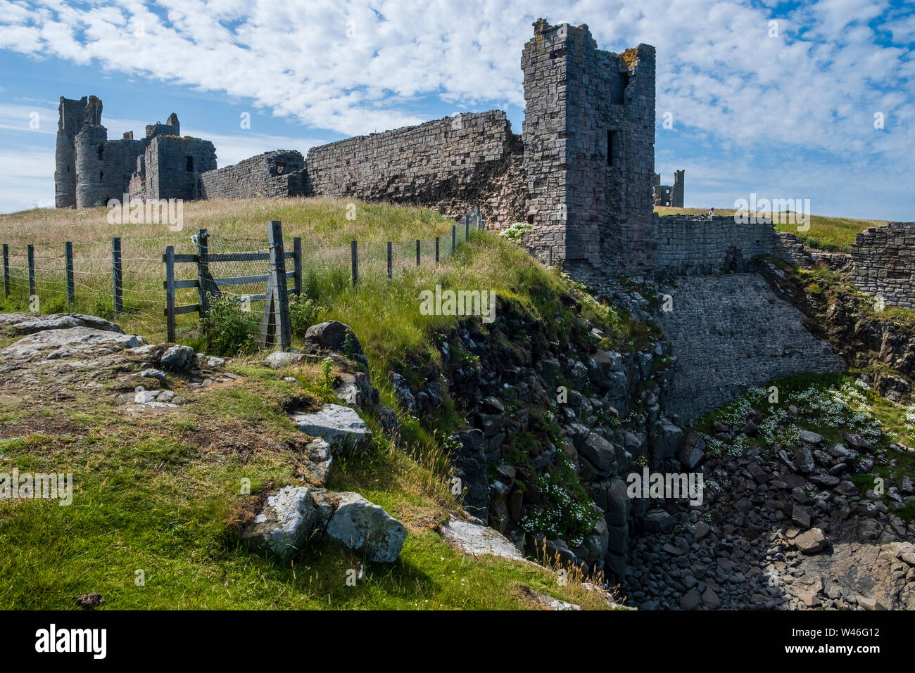 Dunstanburgh Castle in Northumberland Stock Photo