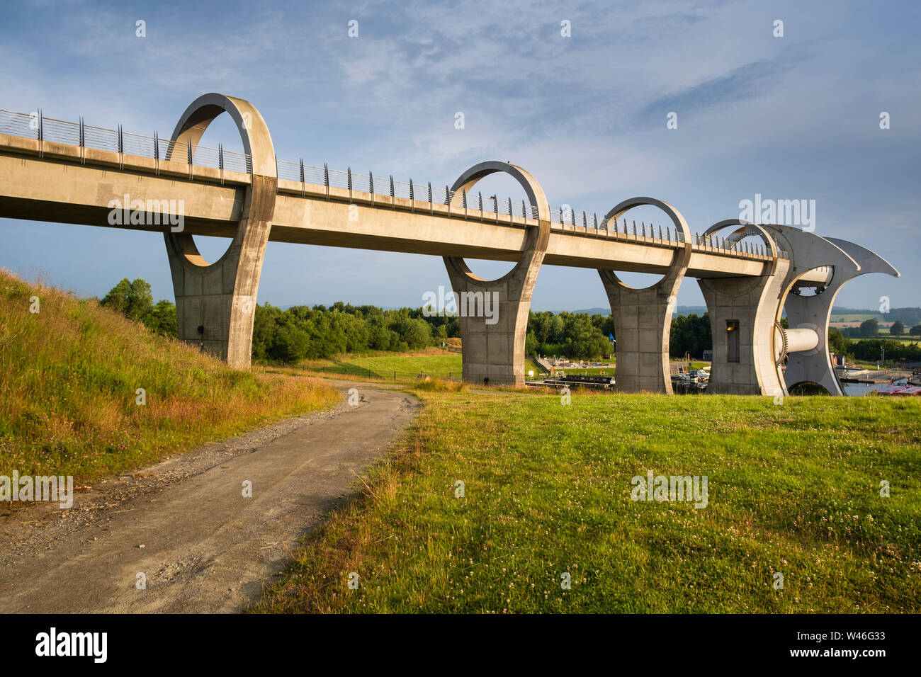 The Falkirk Wheel in Scotland is a rotating canal boat lift a form of high rise lock connecting the Forth and Clyde Canal with the Union Canal. Stock Photo