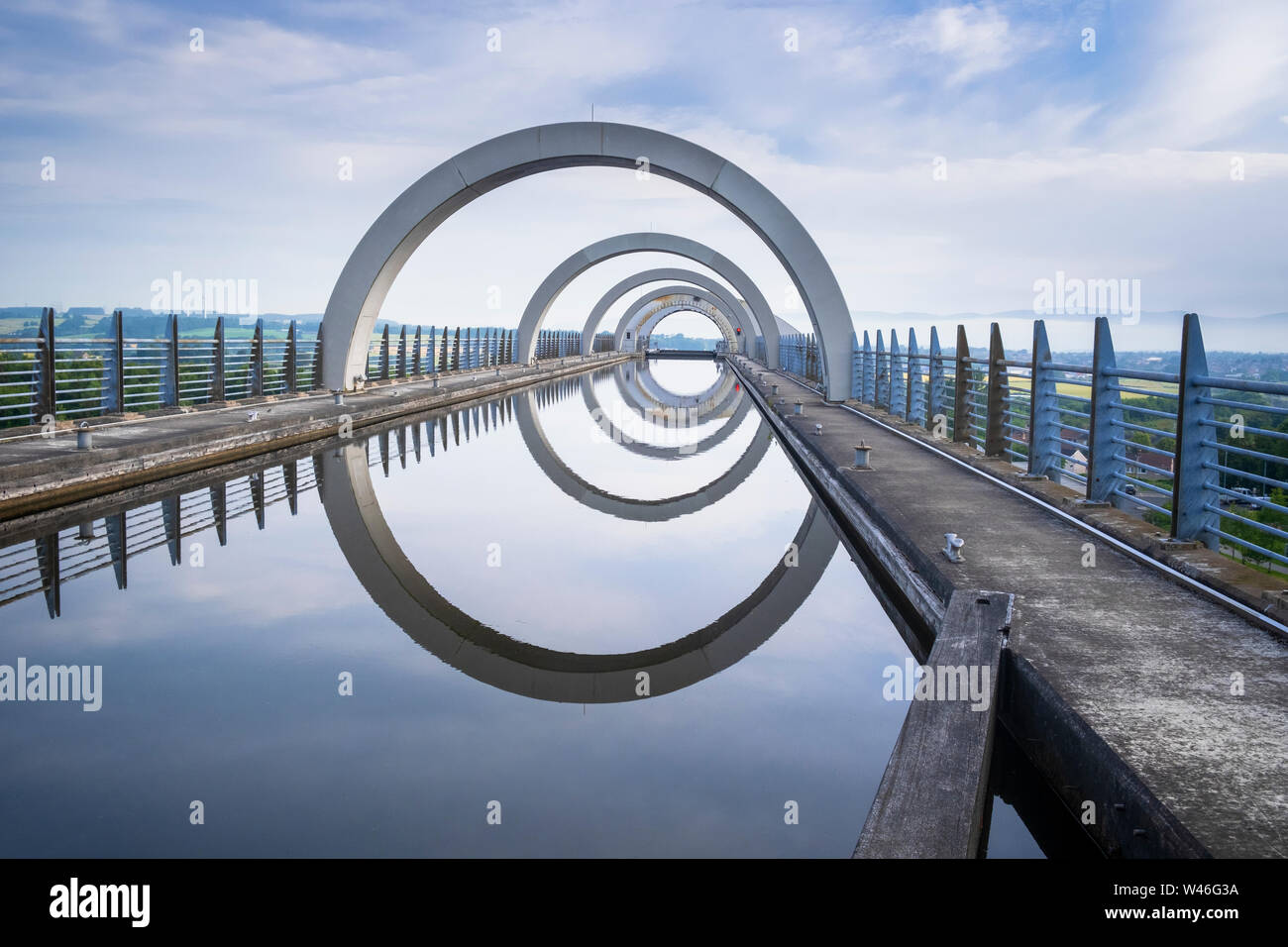 The Falkirk Wheel in Scotland is a rotating canal boat lift a form of high rise lock connecting the Forth and Clyde Canal with the Union Canal. Stock Photo