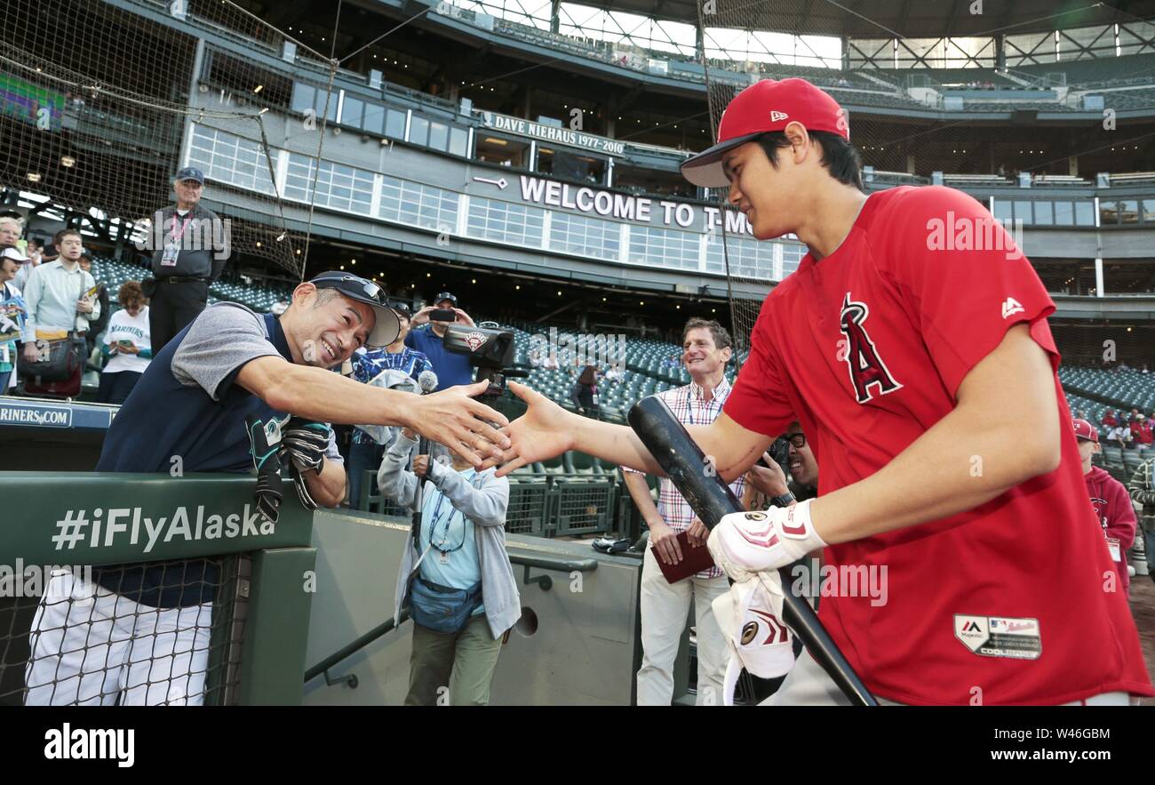 Los Angeles Angels two-way player Shohei Ohtani (L) and former Seattle  Mariners star Ichiro Suzuki talk before a spring training game in Peoria,  Arizona, on March 17, 2021. (Kyodo)==Kyodo Photo via Credit
