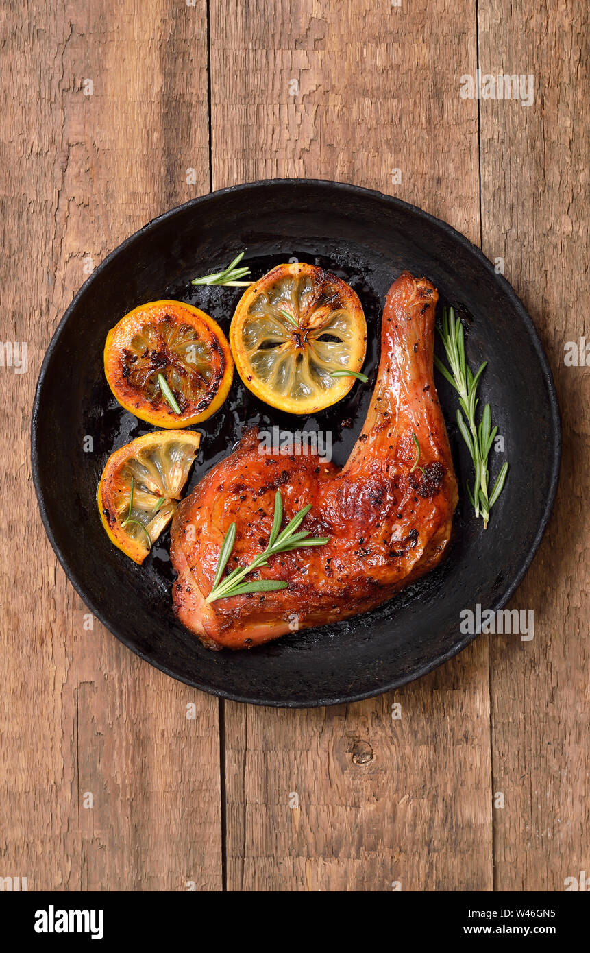 Grilled chicken leg in frying pan, top view Stock Photo Alamy