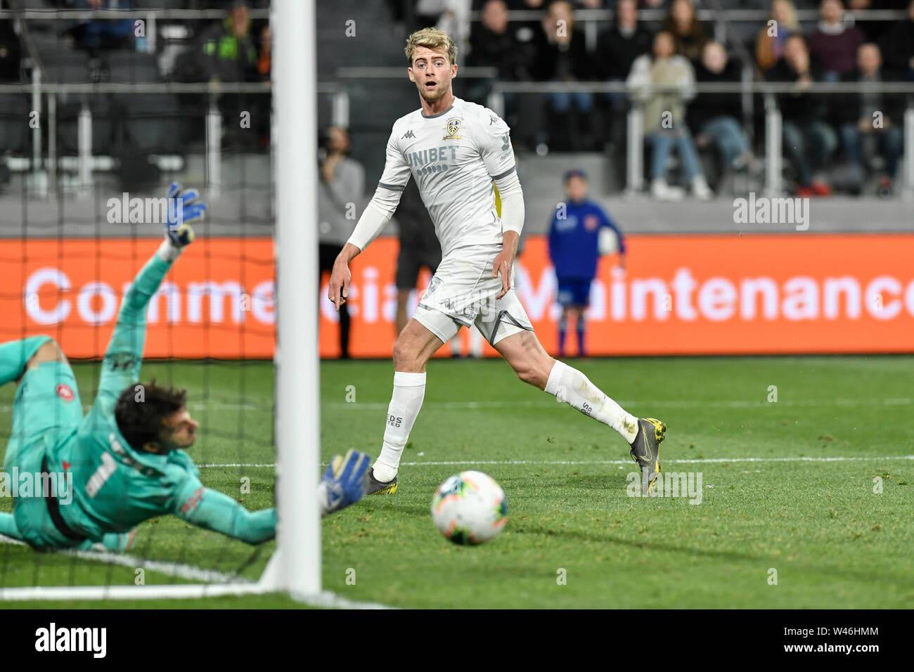 Bankwest Stadium, Sydney, Australia. 20th July, 2019. International friendly football match, Western Sydney Wanderers FC versus Leeds United; Patrick Bamford of Leeds United times his leap to direct the ball goalwards but goes wide of the post as Daniel Lopar of Western Sydney Wanderers dives to cover Credit: Action Plus Sports/Alamy Live News Stock Photo