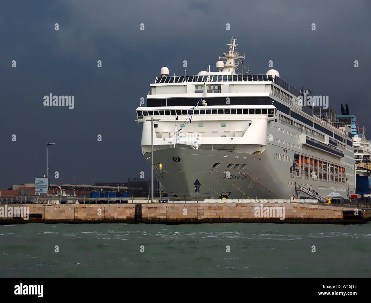 Huge cruise ship st the Venice cruise port terminal waiting for