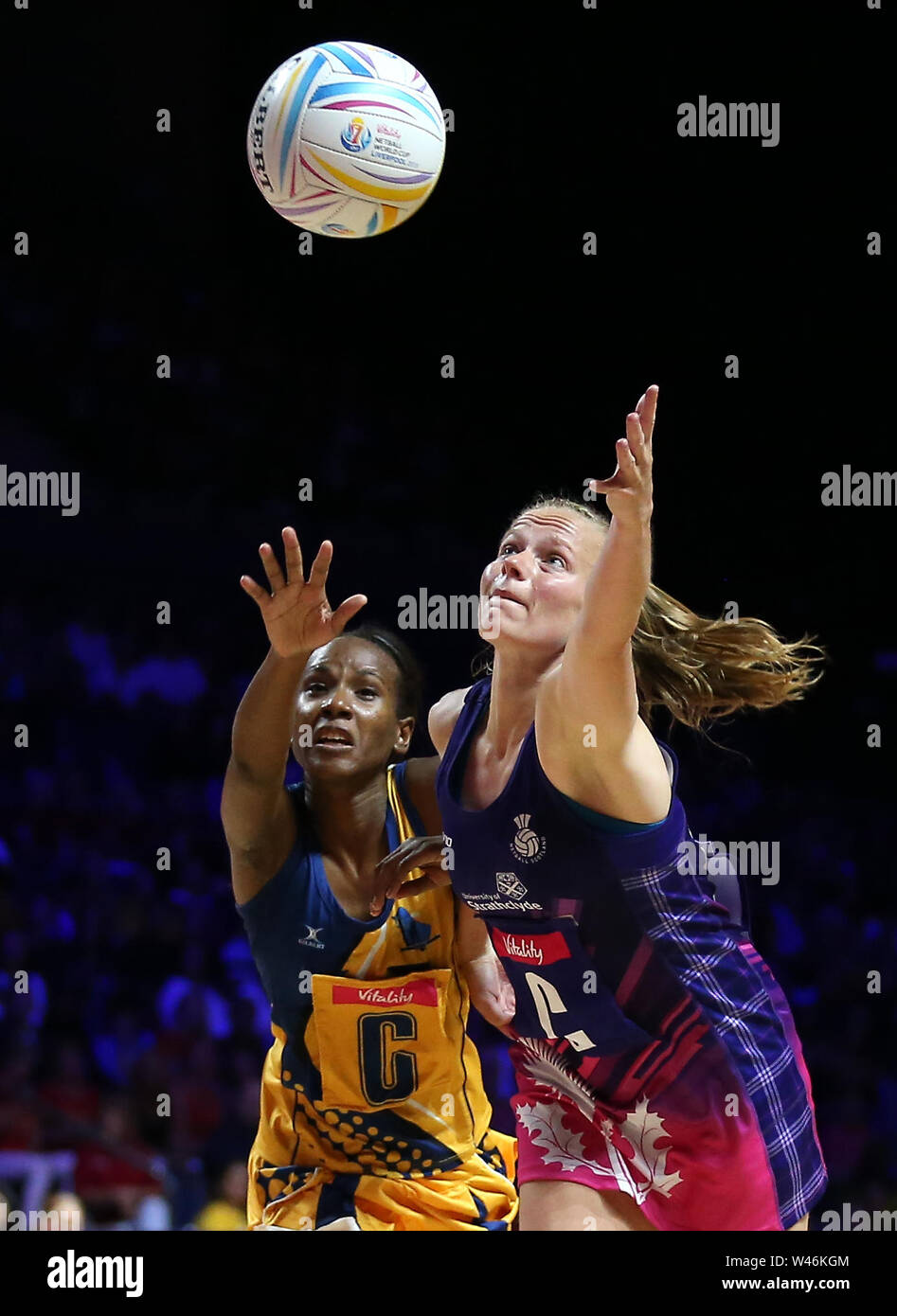 Barbados' Tonisha Rock-Yaw (left) and Scotland's Claire Maxwell battle for the ball during the Netball World Cup match at the M&S Bank Arena, Liverpool. Stock Photo