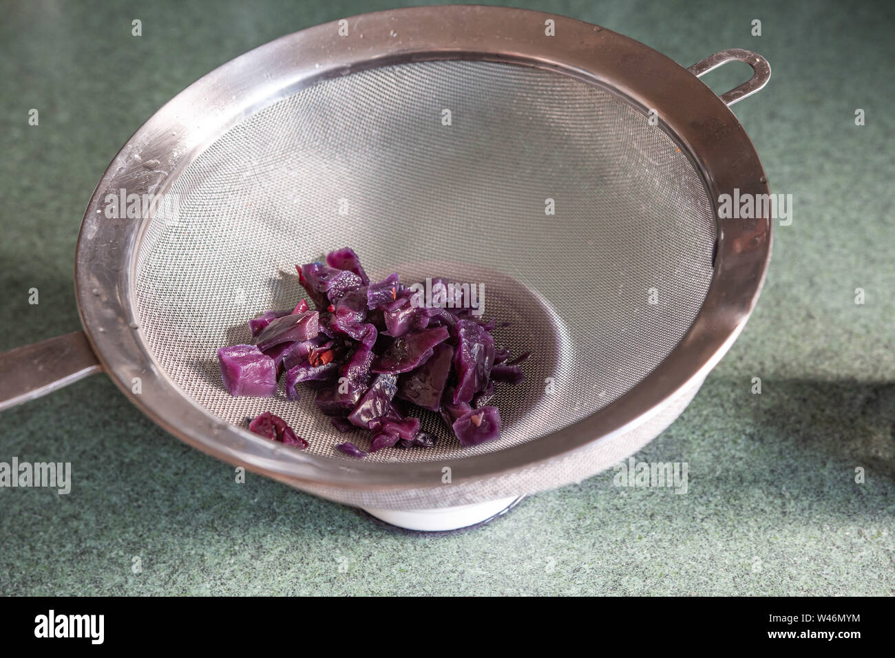 Making red cabbage indicator at home. Showing the separated out cabbage