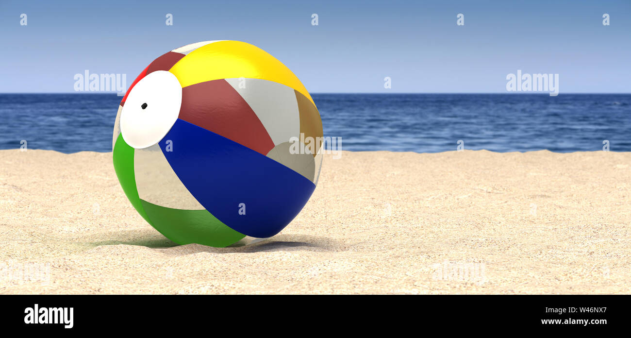 A beach ball on a beach and sea Stock Photo Alamy