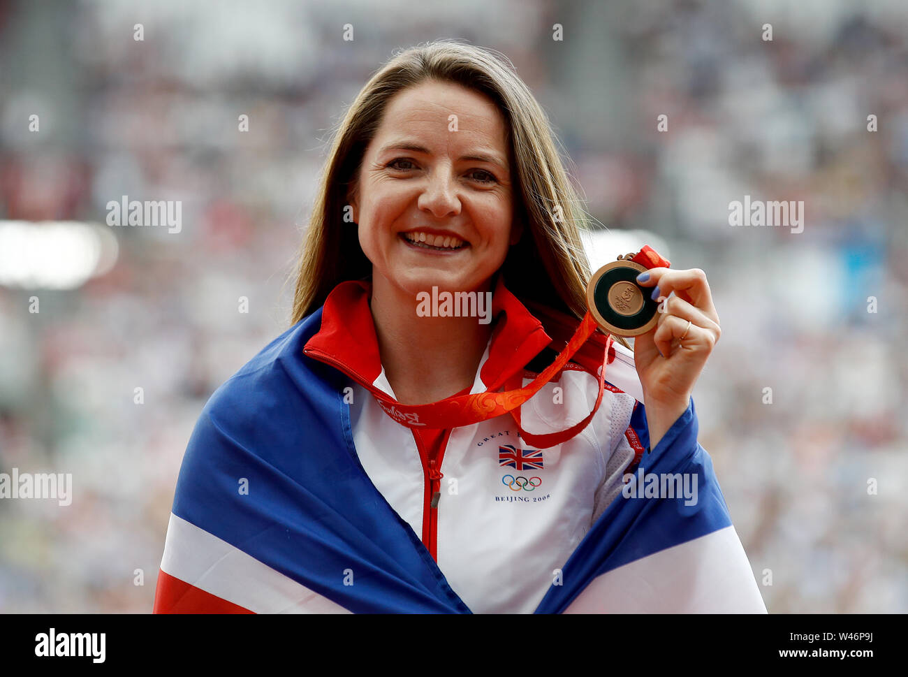 Great Britain's Goldie Sayers holds a bronze medal from the 2008 Beijing Olympics after being upgraded to third in the Women's Javelin after Mariya Abakumova was stripped of the silver medal during day one of the IAAF London Diamond League meet at the London Stadium. Stock Photo