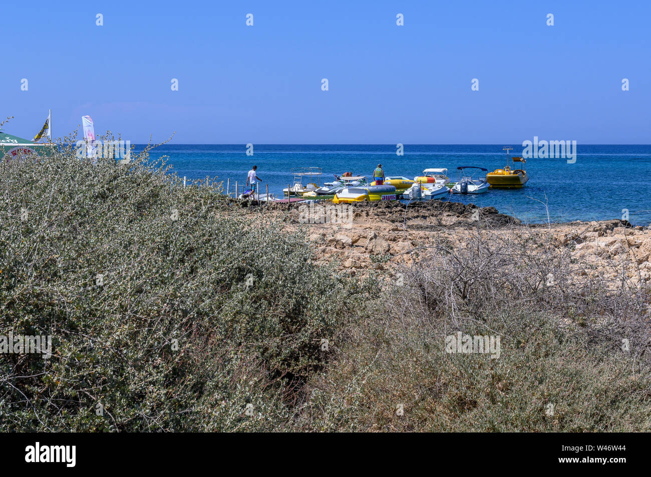Boats on the Sea in Sunrise Beach Protaras, Cyprus Stock Photo