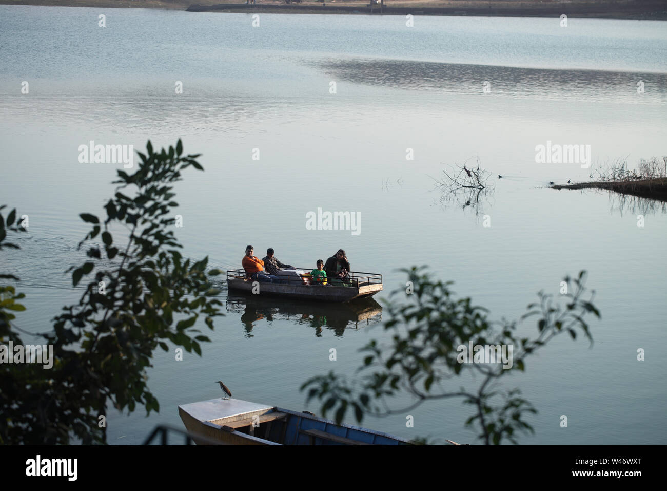 Tourists boating in a lake, Damdama Lake, Sohna, Gurgaon, Haryana, India Stock Photo