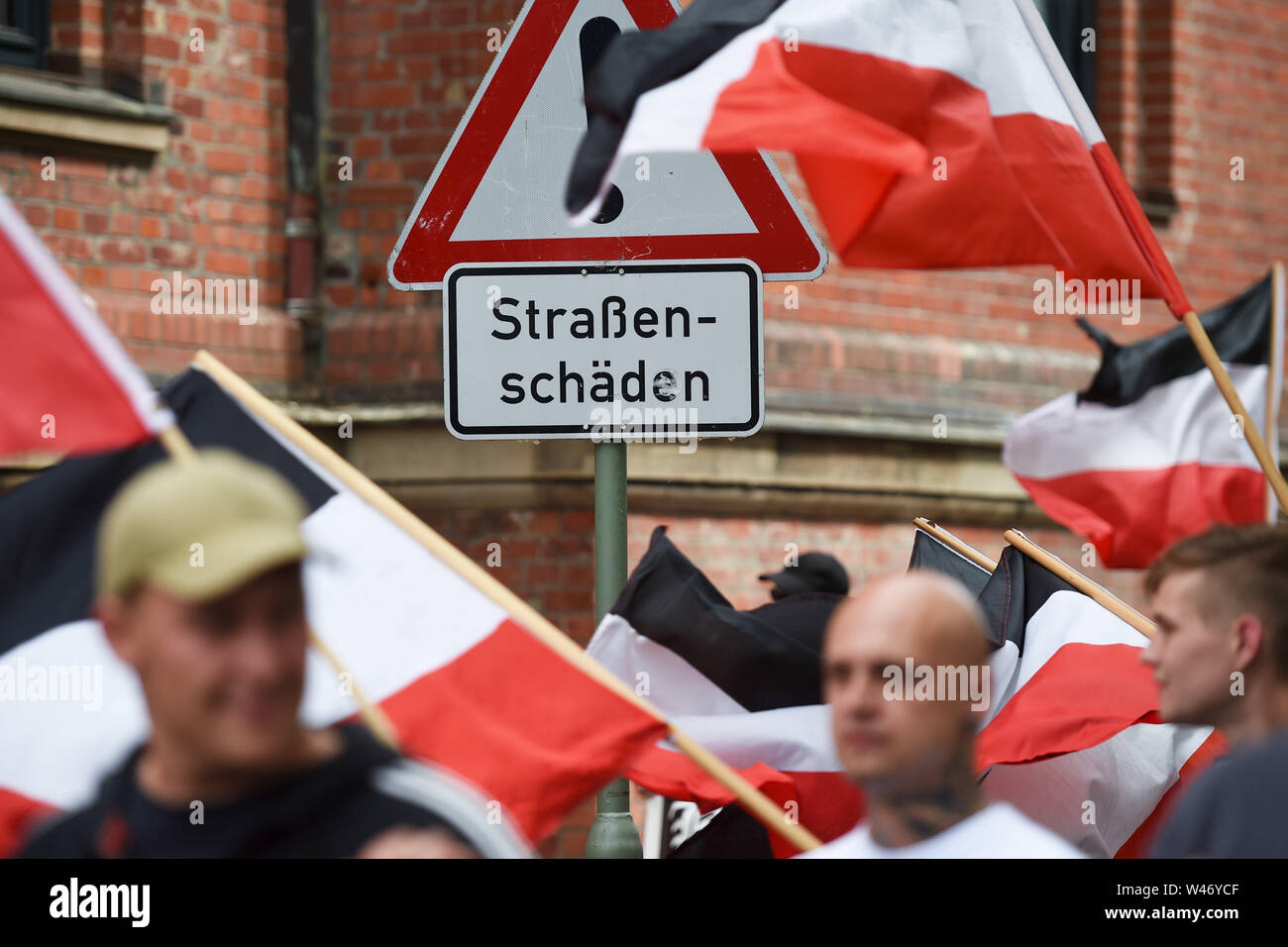 Hanover, Germany. Kassel, Germany. 20th July, 2019. Supporters of the small party 'The Rights' gather before their demonstration. The party had called for a demonstration in Kassel against media prejudgement in connection with the Lübcke case. A massive police presence is to prevent possible riots between the two camps. Credit: Uwe Zucchi/dpa/Alamy Live News Stock Photo