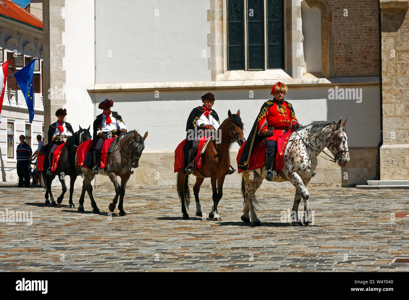 Cravat Regiment Guard of Honor, Kravat, men, horseback, Croat uniforms , St. Marks Square, ceremonial, Zagreb; Croatia; Europe; summer, horizontal Stock Photo