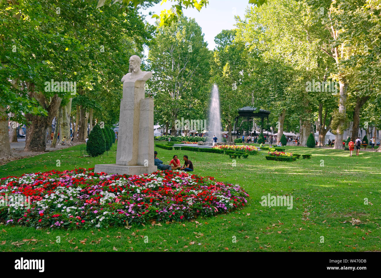 Zrinski Square; a Green Horseshoe park; 1826; fountains; colorful flowers; grass, trees, statue, people relaxing, Zagreb; Croatia; Europe; summer, hor Stock Photo