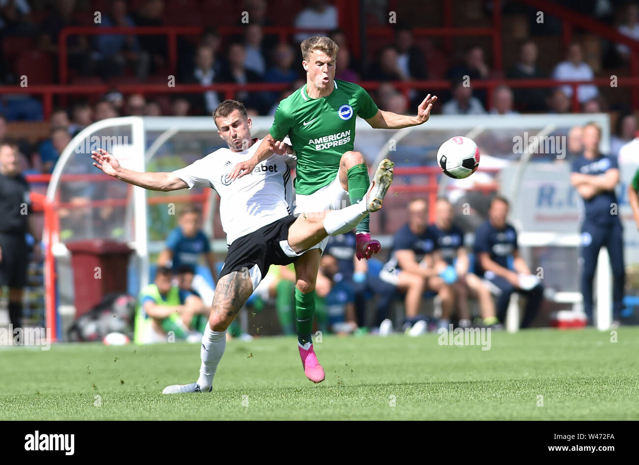 Aldershot UK 20th July 2019 -  Solly March of Brighton (right) wins the ball during the pre season friendly football match between Fulham and Brighton and Hove Albion at the The Electrical Services Stadium in Aldershot   . Credit : Simon Dack / Alamy Live News Stock Photo