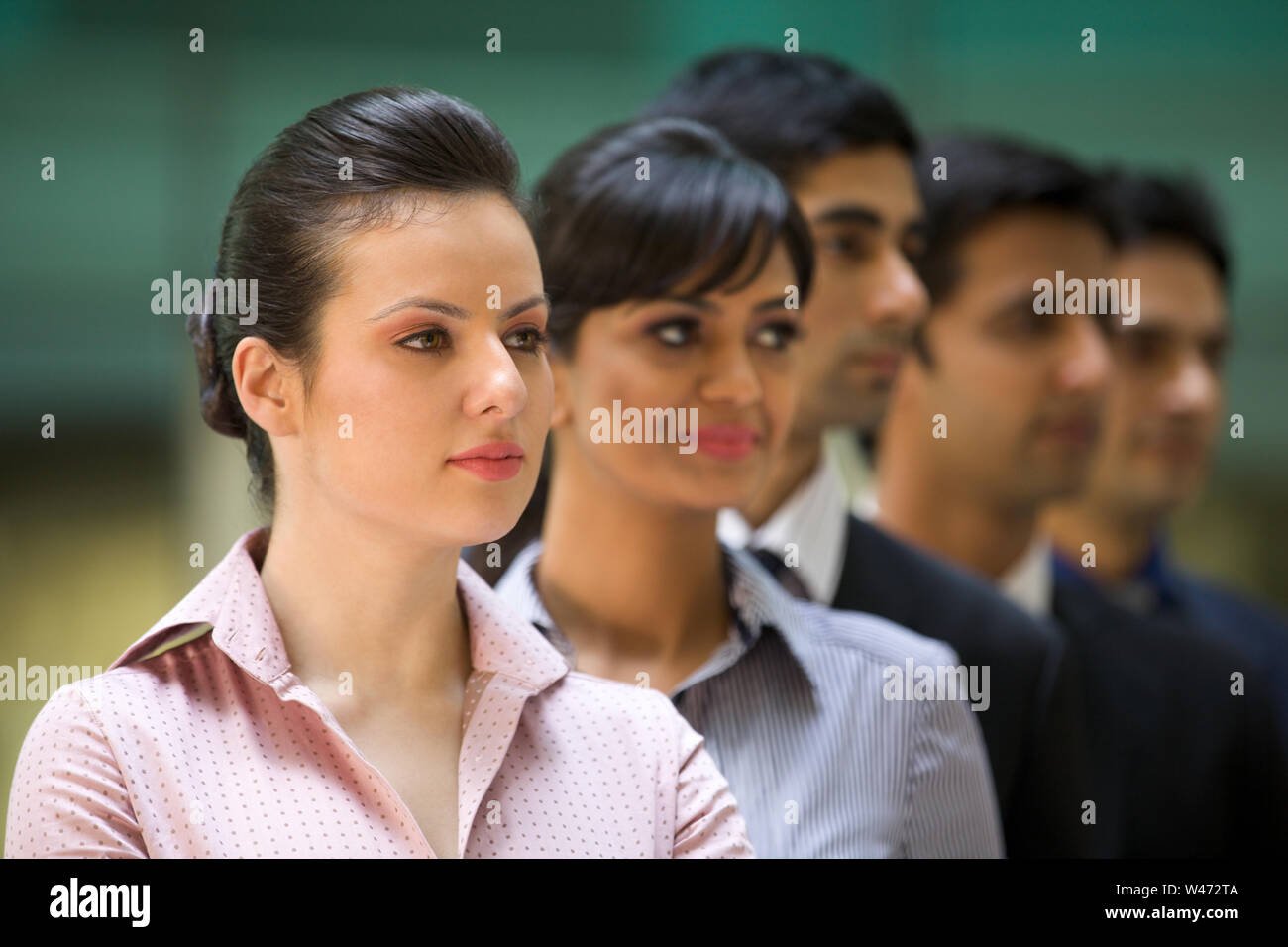 Executives standing in a row hi-res stock photography and images - Alamy