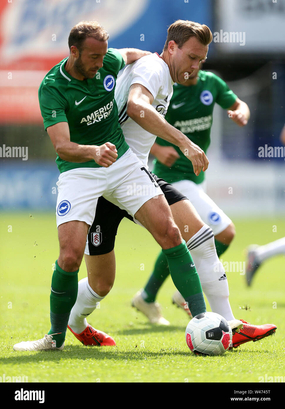 Brighton and Hove Albion Glenn Murray and Fulham Kevin McDonald during the pre-season friendly match at the EBB Stadium, Aldershot. Stock Photo