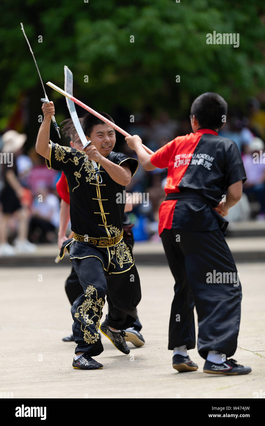 two men sparring with Filipino stick fighting martial arts Stock Photo