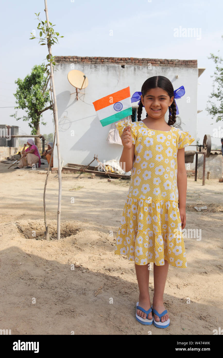 Portrait of a girl holding an Indian flag Stock Photo Alamy