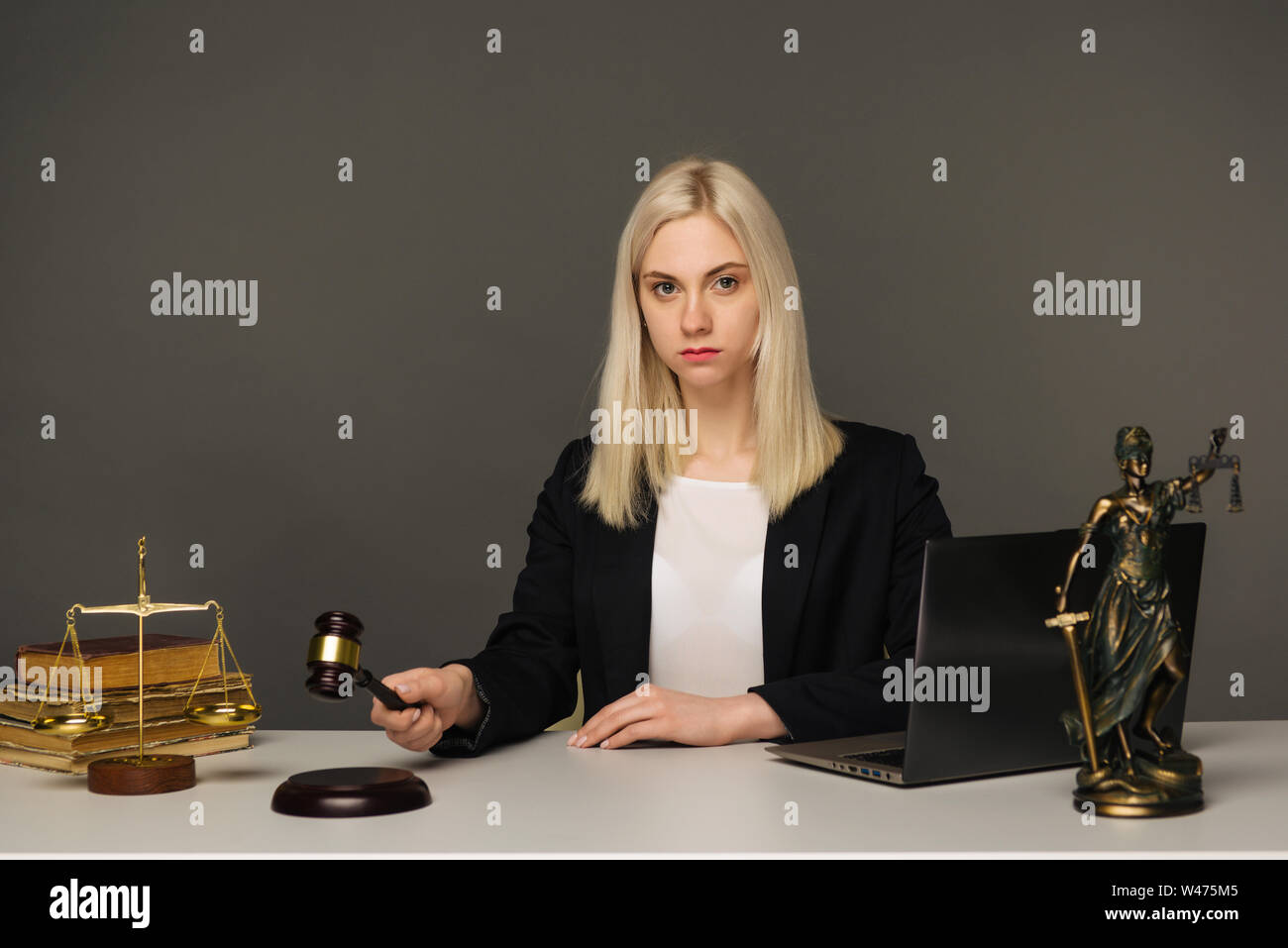 advice and justice concept. Justice scales, justice hammer and Litigation document, female lawyer working legal law with use laptop at lawyer office. Stock Photo
