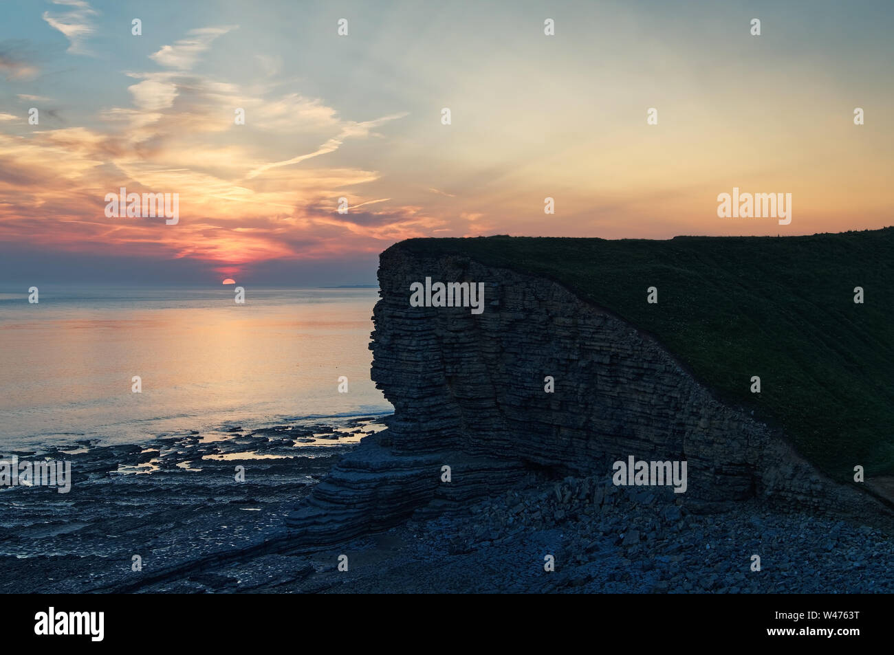 UK,South Wales,Sunset over Nash Point on the Glamorgan Heritage Coastline Stock Photo