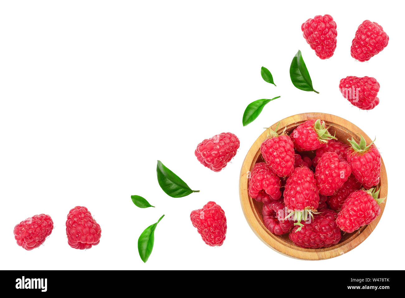 Raspberry Flat Lay raspberries in wooden bowl with leaves isolated on white background ...