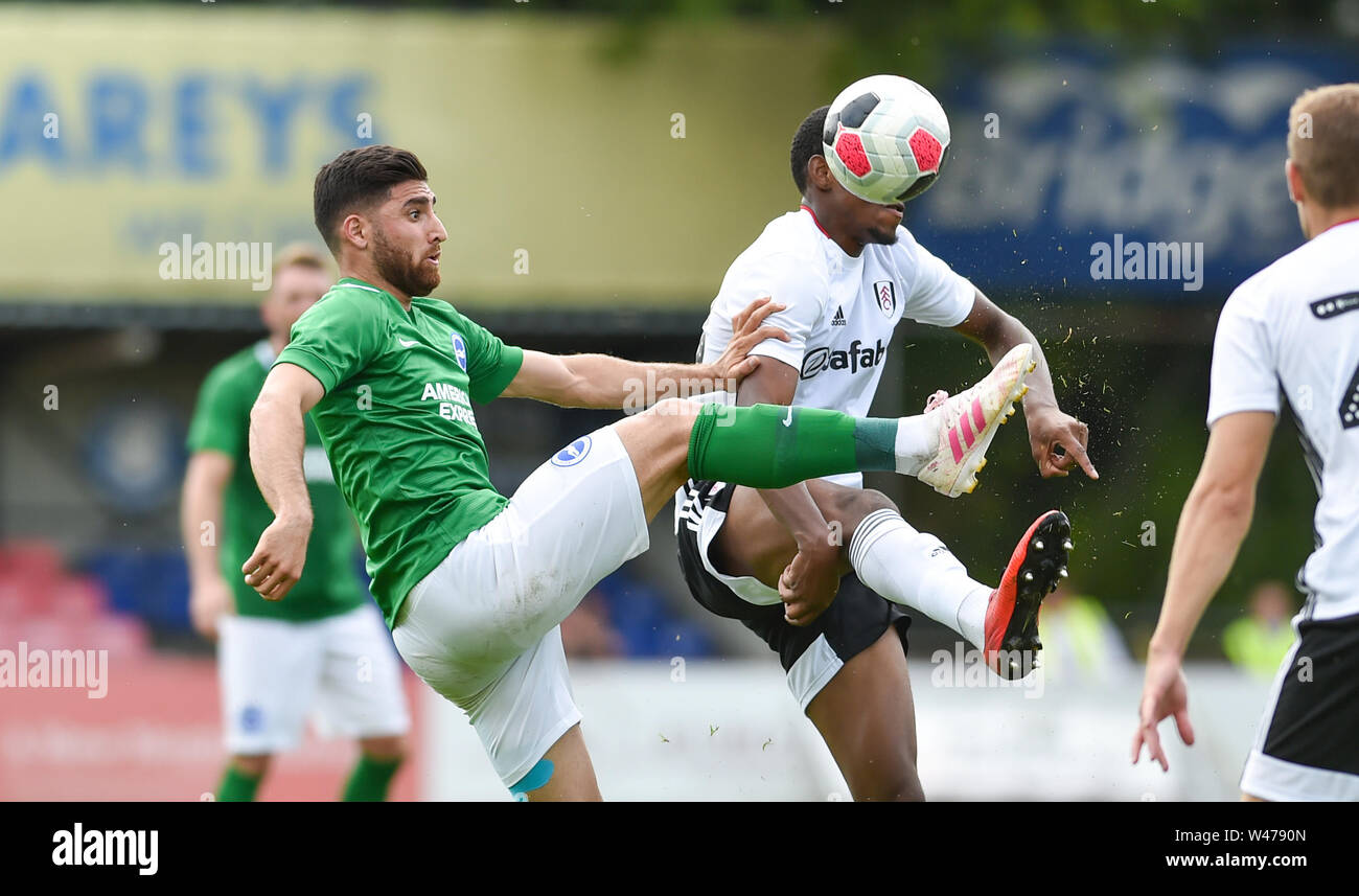 Aldershot UK 20th July 2019 - Alireza Jahanbakhsh of Brighton gets his foot  in during the pre season friendly football match between Fulham and  Brighton and Hove Albion at the The Electrical