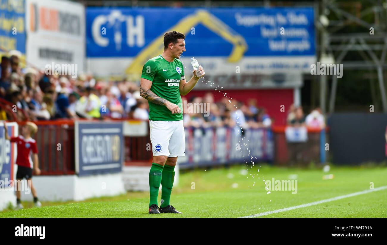 Aldershot UK 20th July 2019 - Lewis Dunk of Brighton  during the pre season friendly football match between Fulham and Brighton and Hove Albion at the The Electrical Services Stadium in Aldershot   . Credit : Simon Dack / Alamy Live News Stock Photo