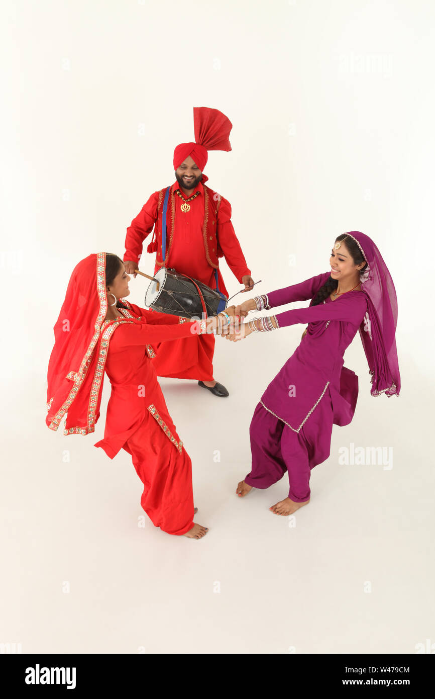 Dancers performing folk dance Stock Photo
